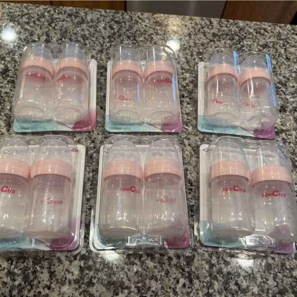 specra Other - 12 NEW NWT Specra breast milk storage bottles Pink and Clear Baby Bottles Set